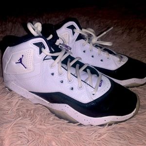 White & Black & Purple Jordan’s.